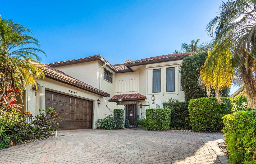 Welcome to this spacious 4 bedroom, 4 bathroom residence located in the sought after Boca Pointe community.