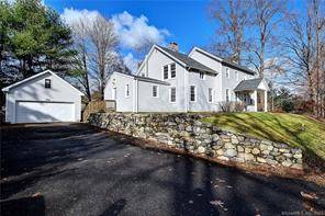 Welcome to 75 Hillhouse Rd located in desirable Heritage Village.