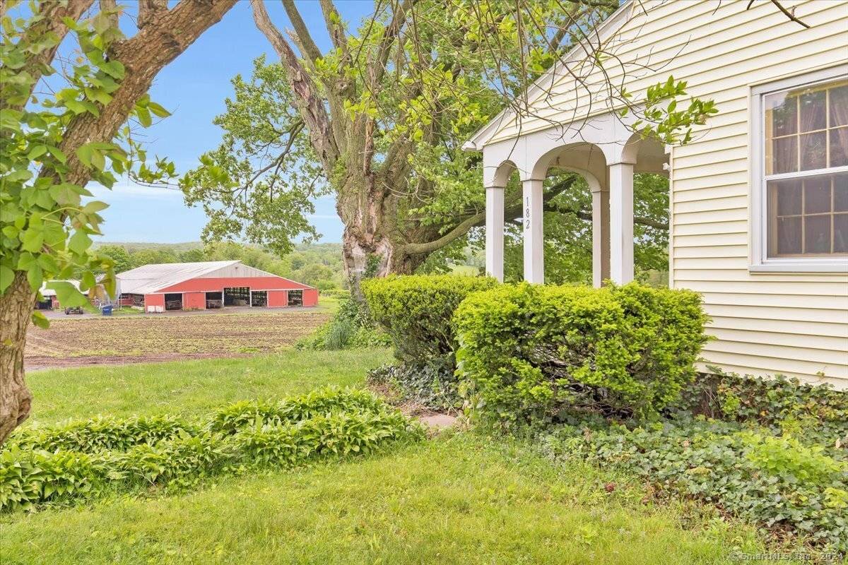 The Greenbacker's Brookfield Farm located midway between Hartford and New Haven in Durham Connecticut has two houses, dairy barn and many other outbuildings.