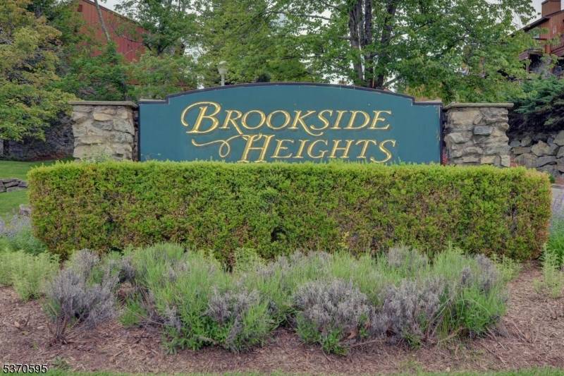 Stunning mountain views from this fully updated townhouse in desirable Brookside Heights !