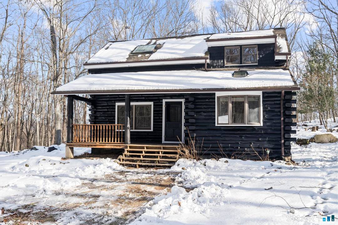 Tucked away on 2. 27 private acres, this charming 3 bedroom, 2 bath home offers the perfect cabin style retreat surrounded by nature.