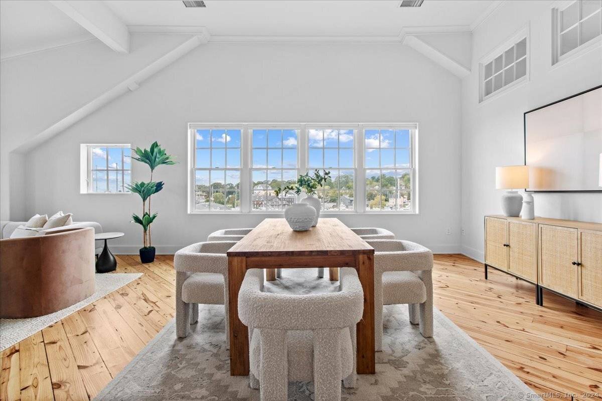 Direct water views of the Mystic River from this penthouse unit at the iconic Spool Mill.