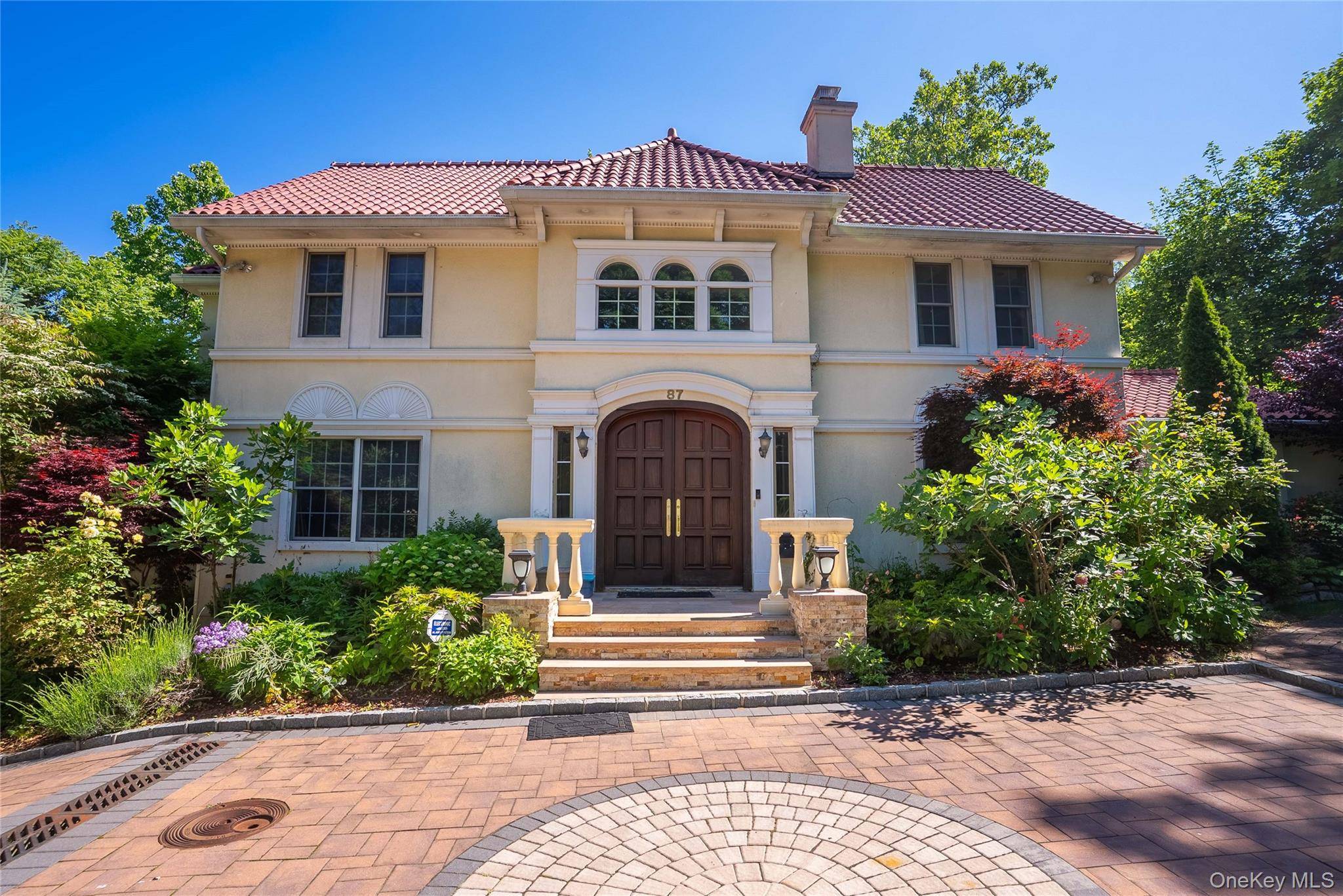 This elegant colonial home ideally situated in the sought after Village of Kensington.
