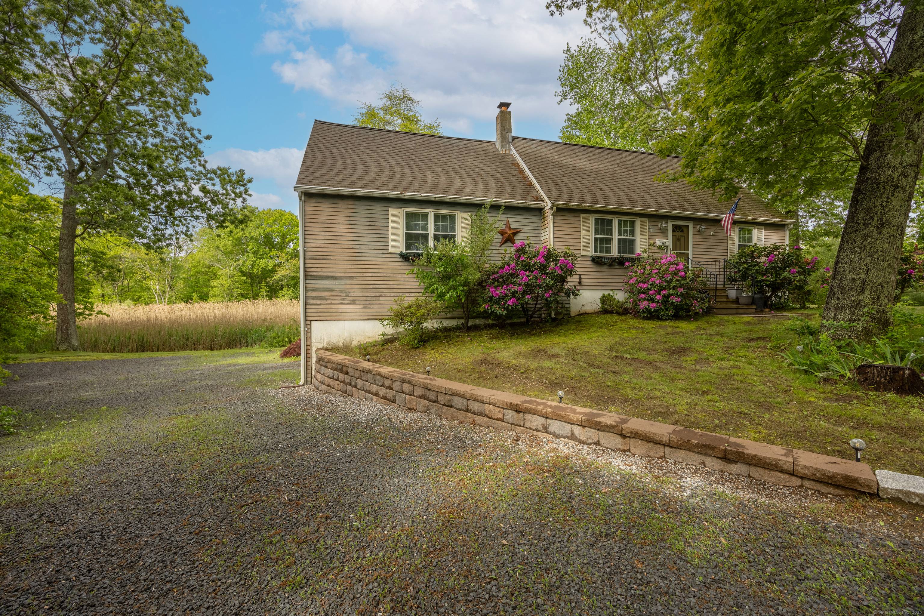Built to Last ! Well Maintained Cape tucked away in a peaceful location backing up to Salt marshes.