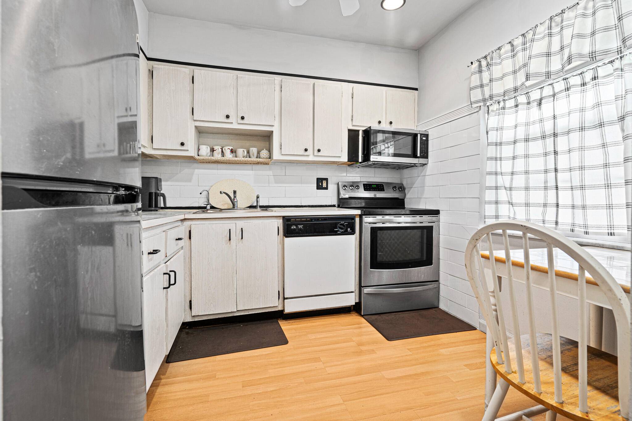 Cozy and well kept, partially furnished 2 2 corner condo on 2nd floor.