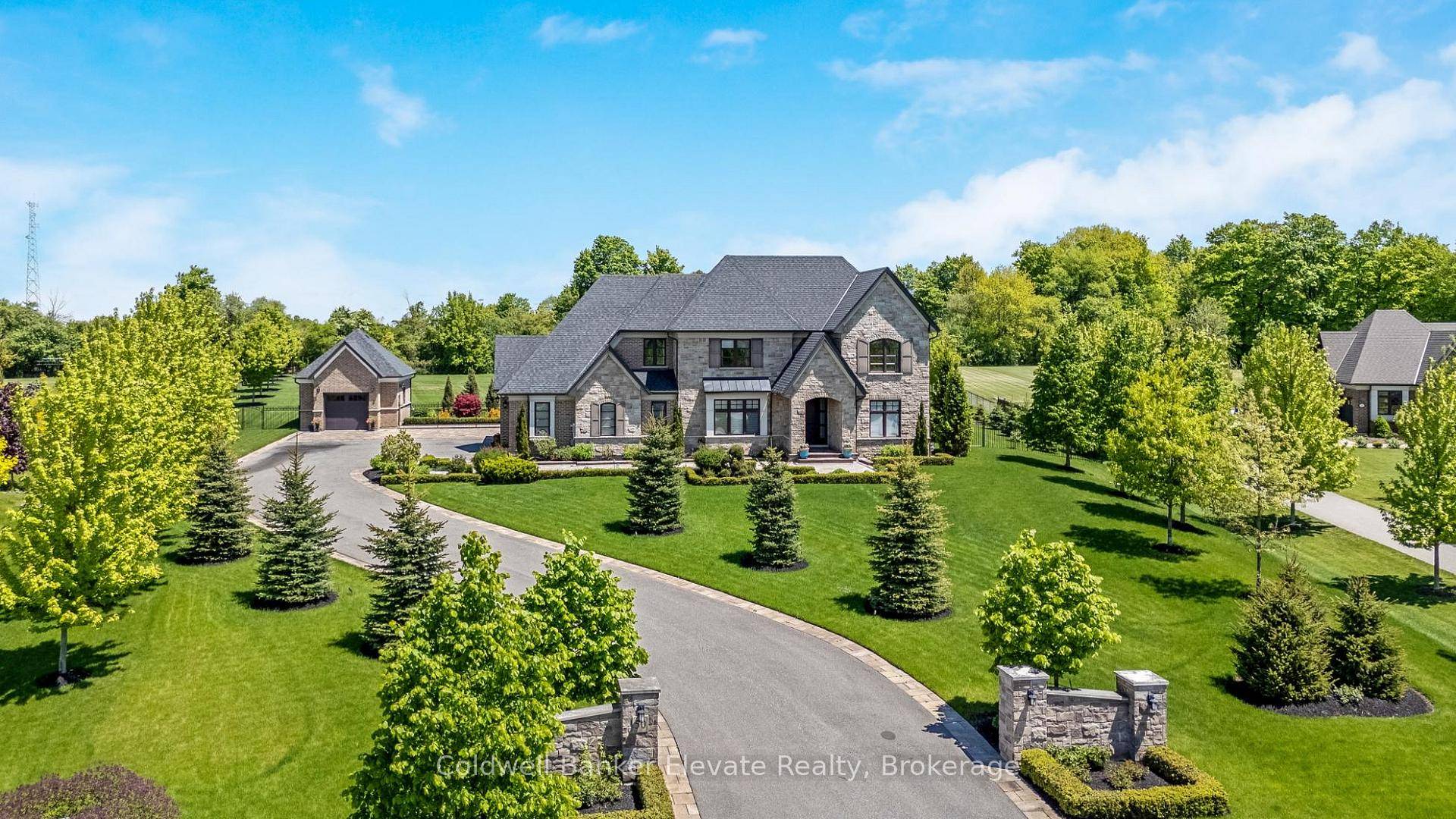 Designed by renowned architect David Small, located in the coveted Black Creek Estates neighbourhood, this Limehouse model welcomes you with manicured grounds and no neighbours behind.