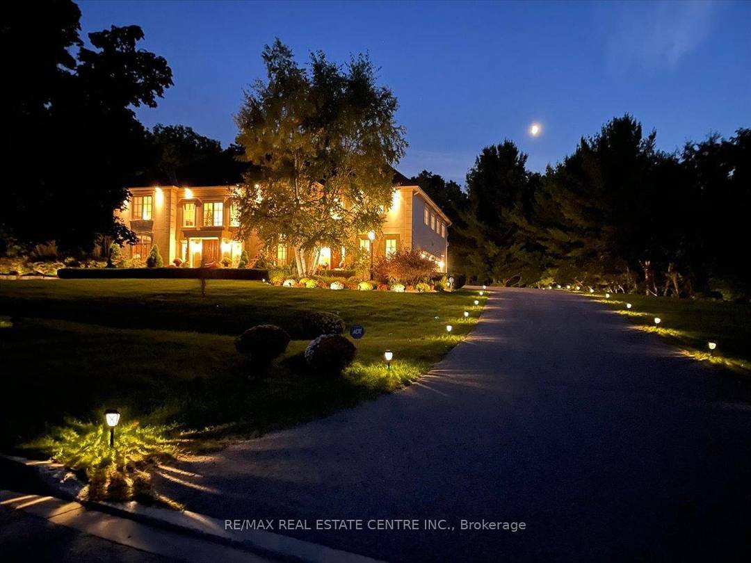 Motivated Seller ! ! ! Exceptional estate living at 65 Kingwood Drive, a rare multi generational residence on approx.