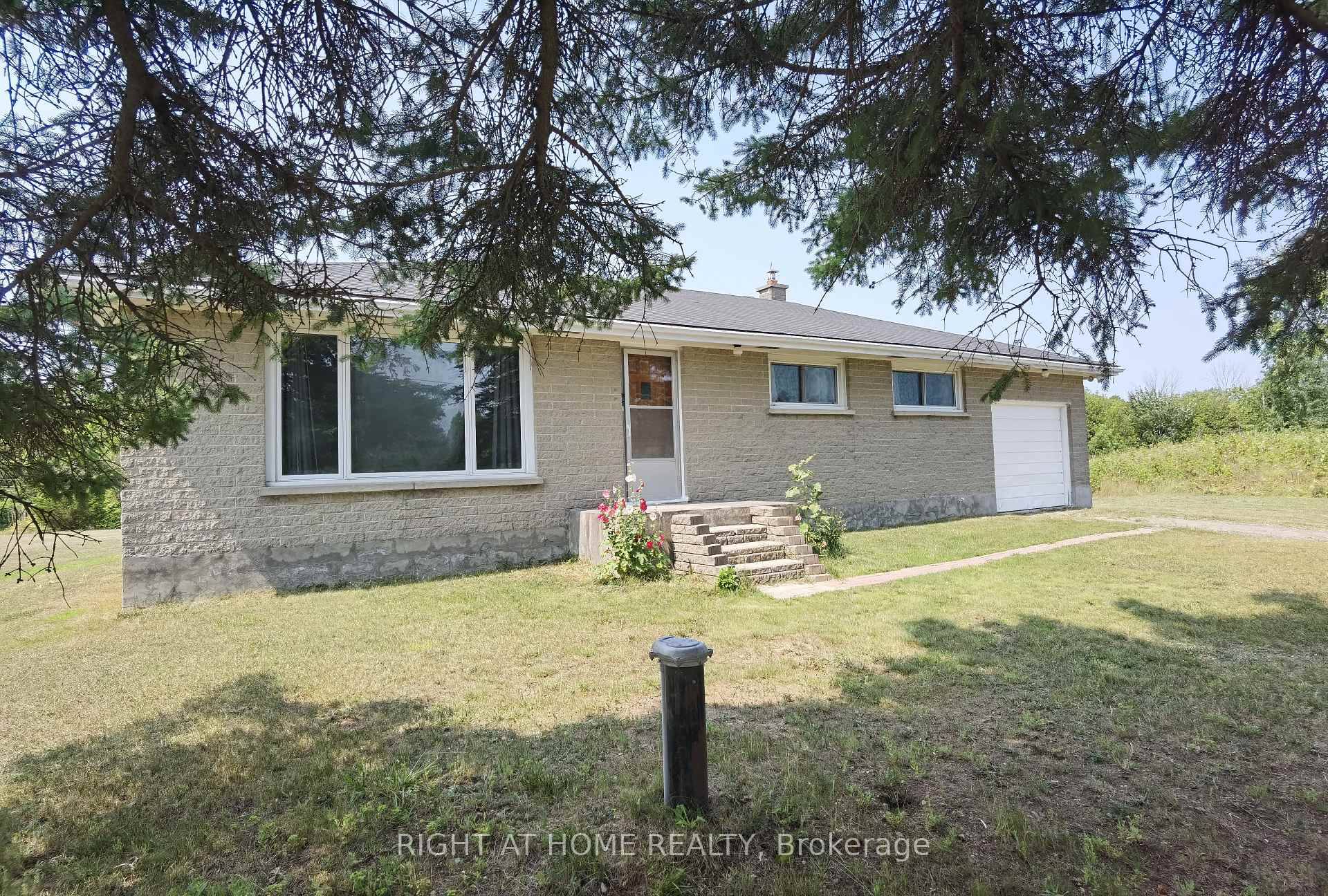 Welcome to this well maintained brick bungalow, which has been lovingly cared for over the years.