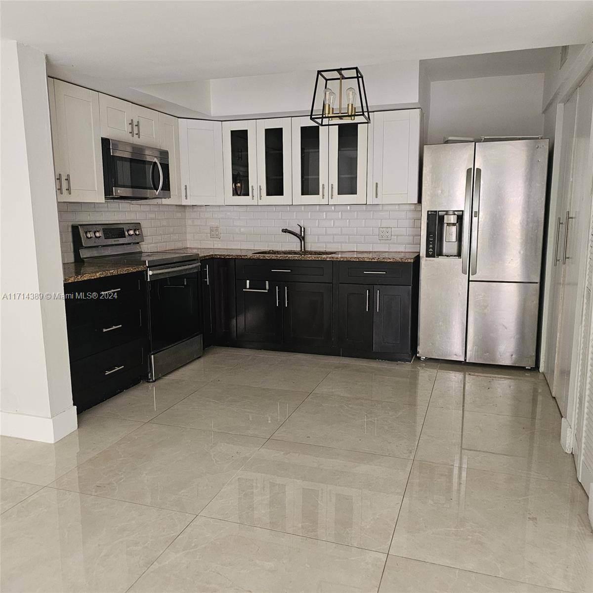Discover the perfect blend of style and convenience in this renovated 3 bedroom, 2 bathrooms corner townhome with a 1 car garage in the desirable Laguna Pointe Subdivision.