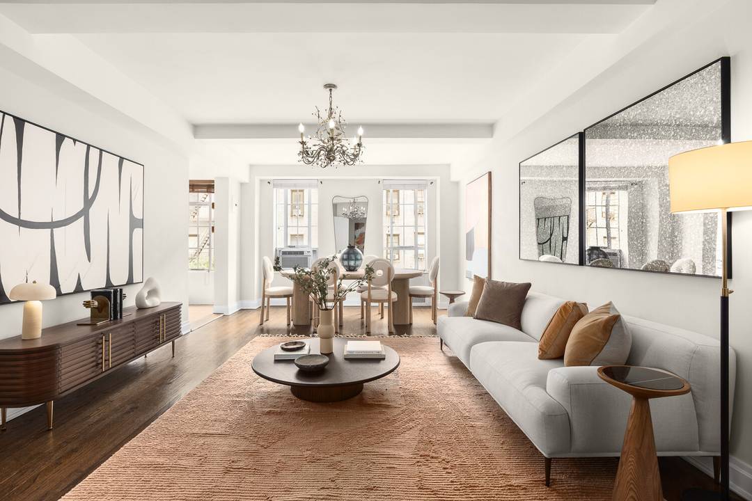 Welcome to Apartment 4J, a charming, oversized studio approx.