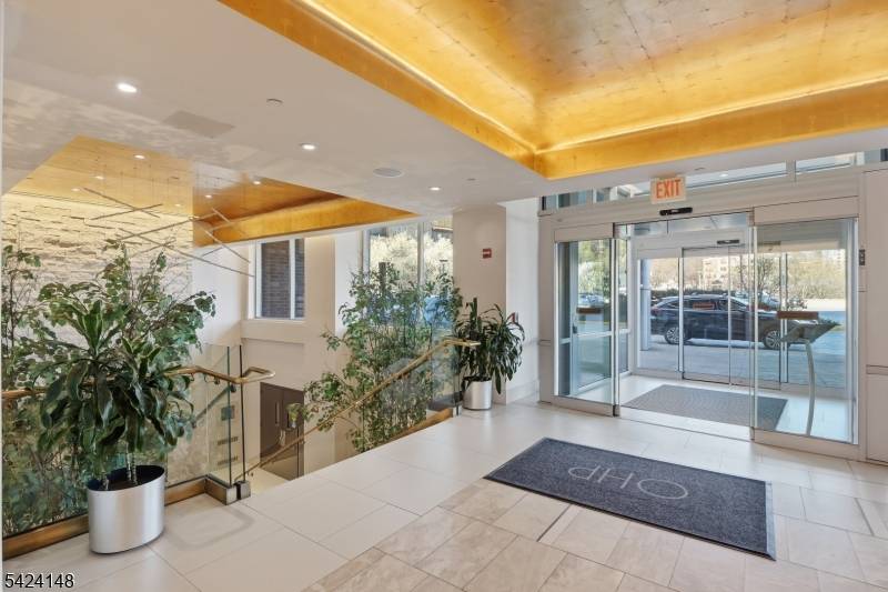 Sophisticated waterfront residence with breathtaking skyline views, where modern elegance meets urban energy.