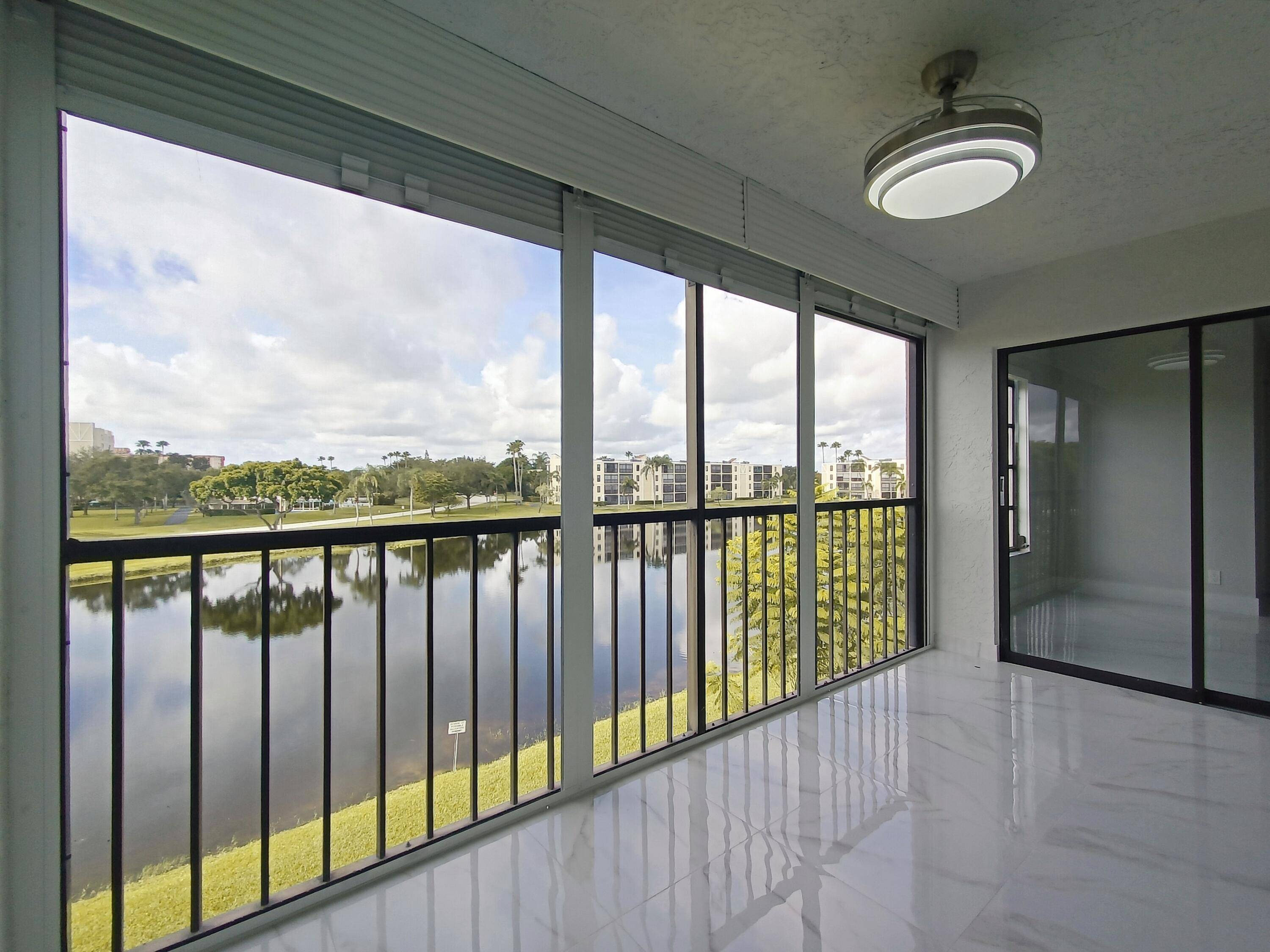 Completely remodeled bright 2b 2b Lancaster unit with panoramic lake view in a vibrant active 55 community of Huntington Lakes.