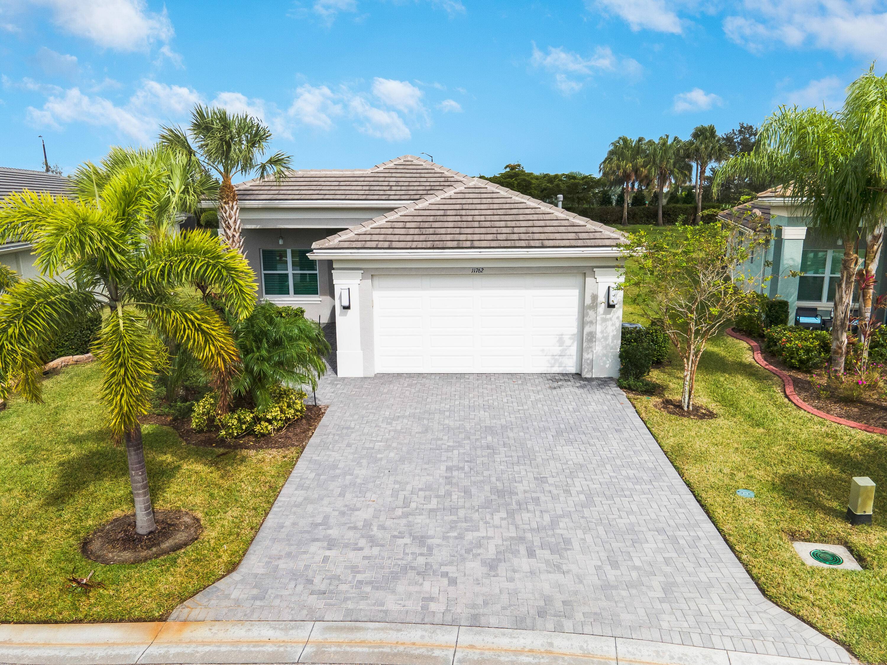 Come live the Valencia lifestyle in this move in ready, beautifully appointed 3 bedroom 2 bathroom Sierra Model with large enclosed lania on a large private lot.