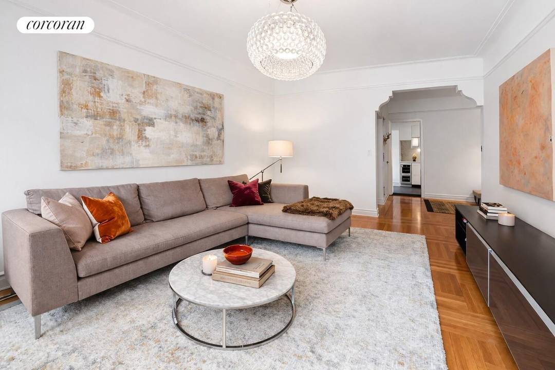 Elegant and spacious, this two bedroom, two bathroom residence with a flexible formal dining room or home office is conveniently located in the heart of historic Jackson Heights.