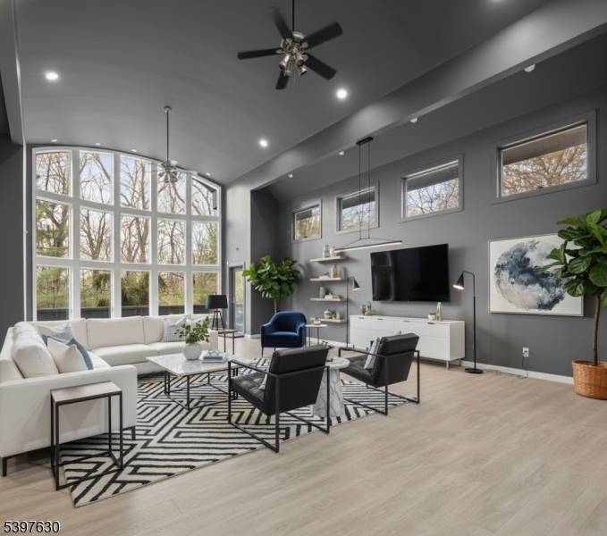 Welcome to this striking, fully renovated modern masterpiece set on over 3 private acres in the prestigious, gated Smoke Rise community.