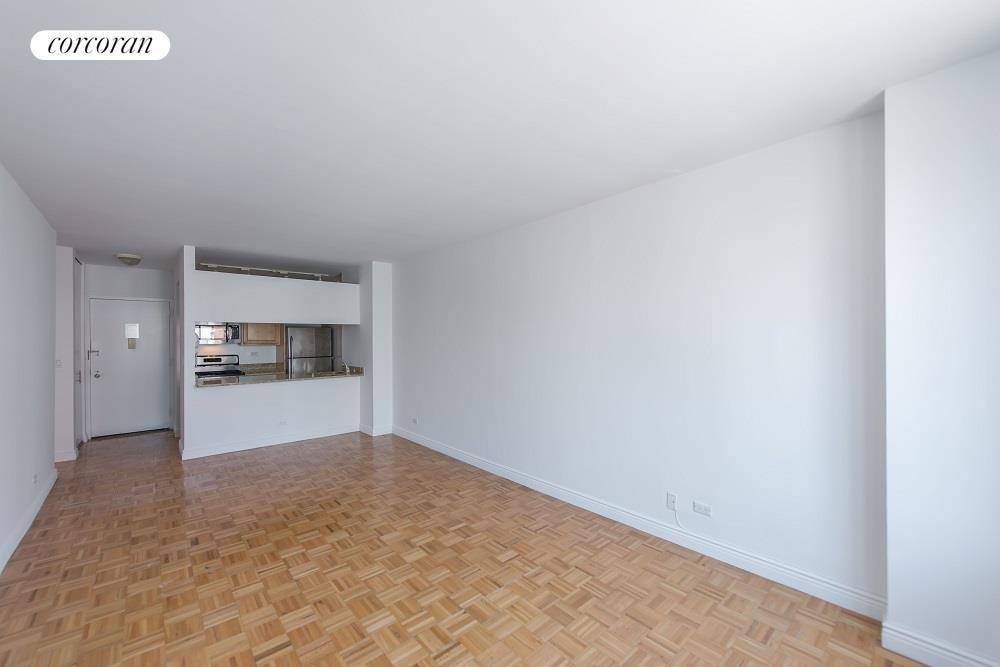 This north facing 2BR 2BA unit features a generously proportioned living space.