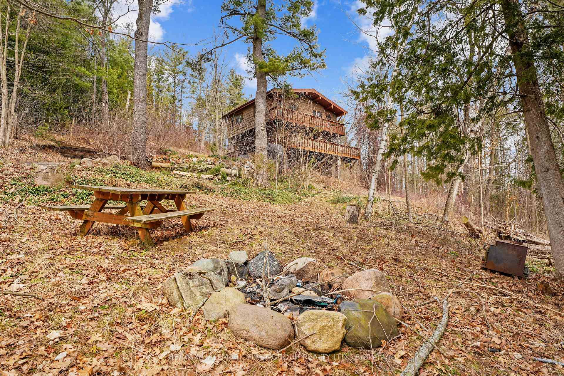 Nestled amongst the trees, this incredible country retreat is a private sanctuary overflowing with character.