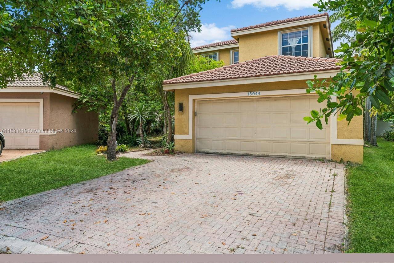 Schedule your showing today to see this beautiful Miramar home nestled on an oversized lot on a cul de sac !