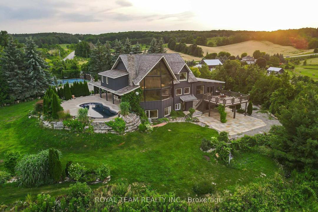 Introducing this incredible Chalet style Home with over 5000 square feet of living space on a 2.