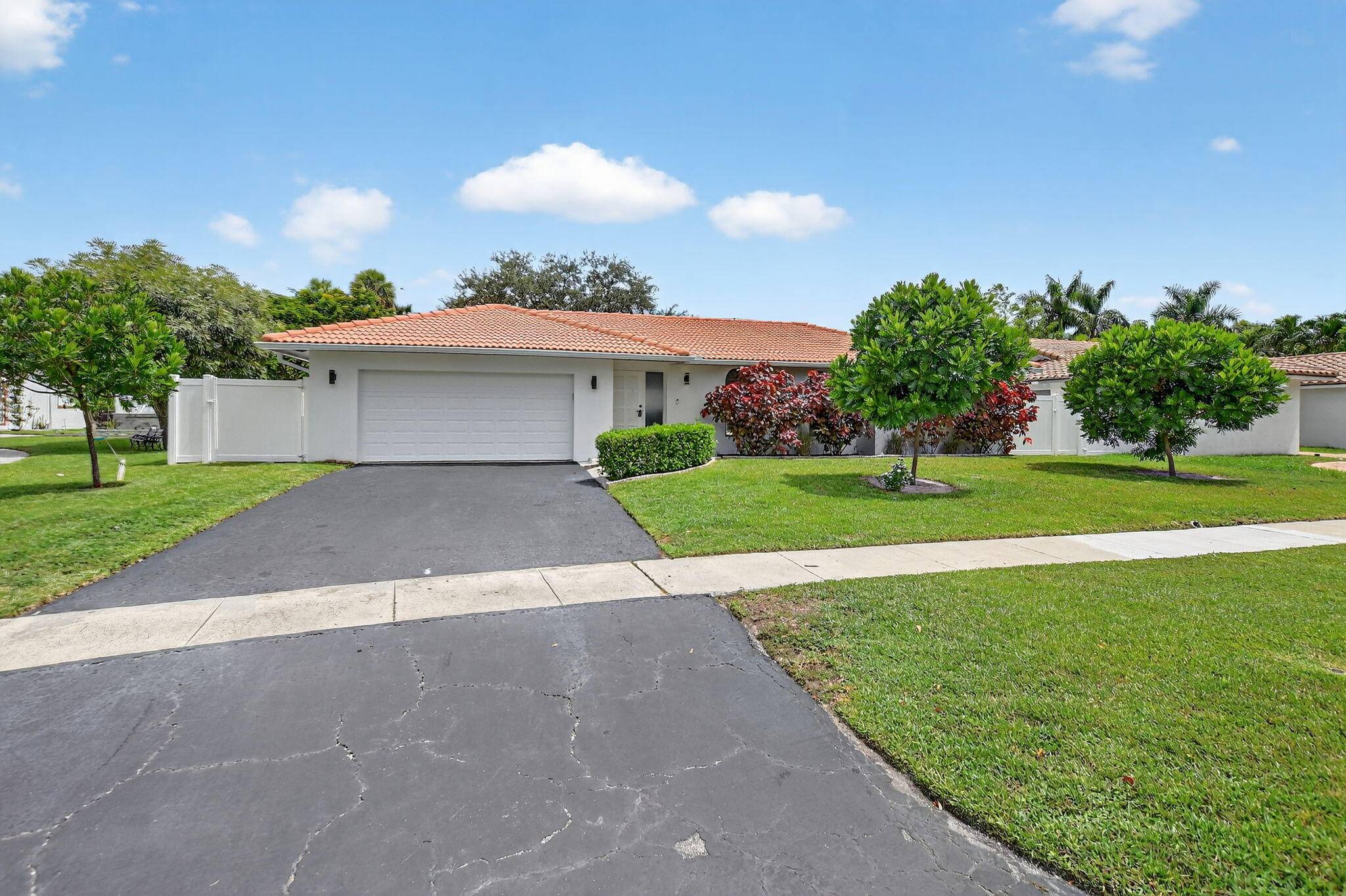 Completely updated 3 bedroom 3 bath home with a pool in the sought after gated community of Paseos.