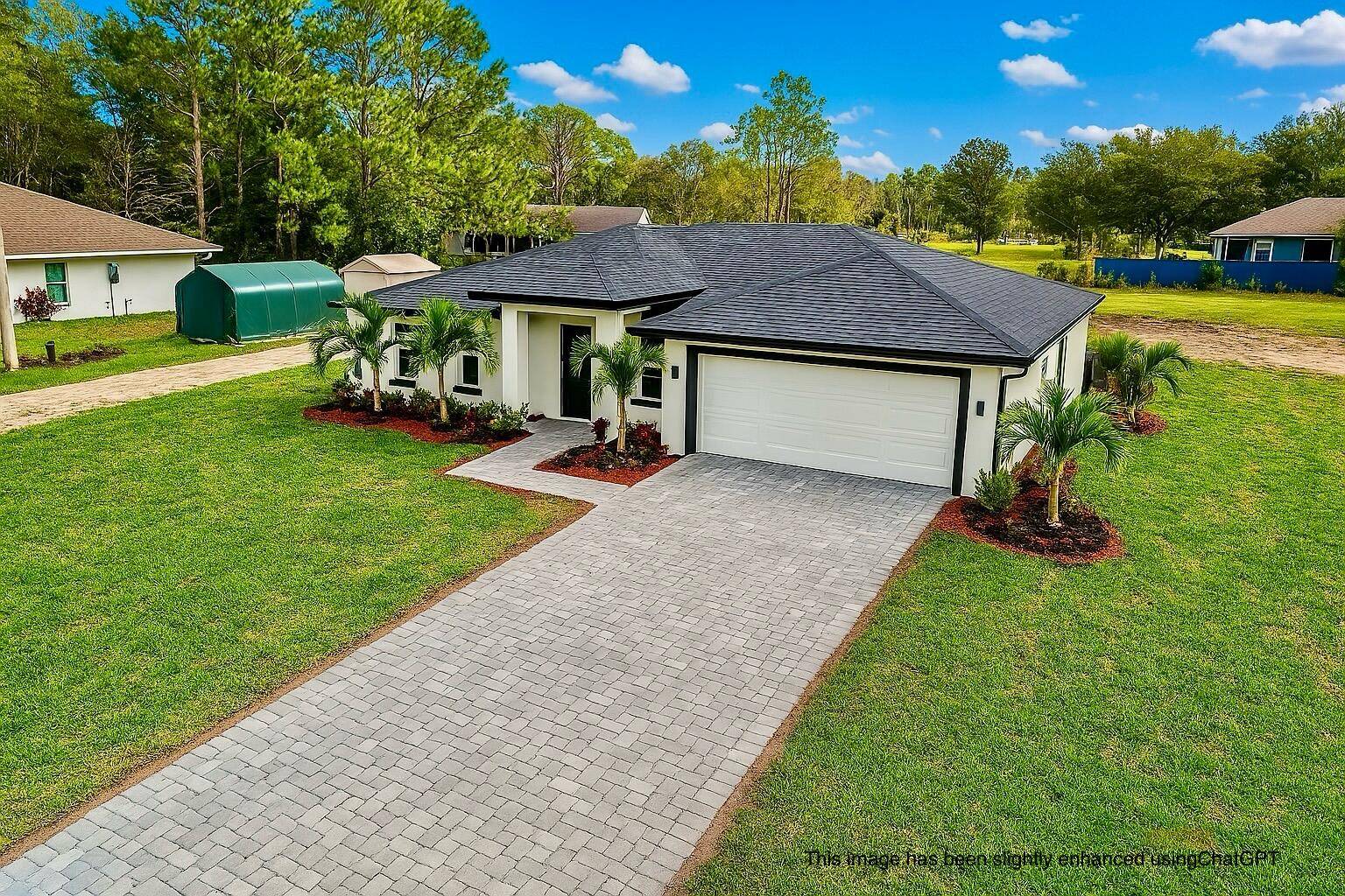 Modern Living Meets Peaceful Acreage in Loxahatchee.