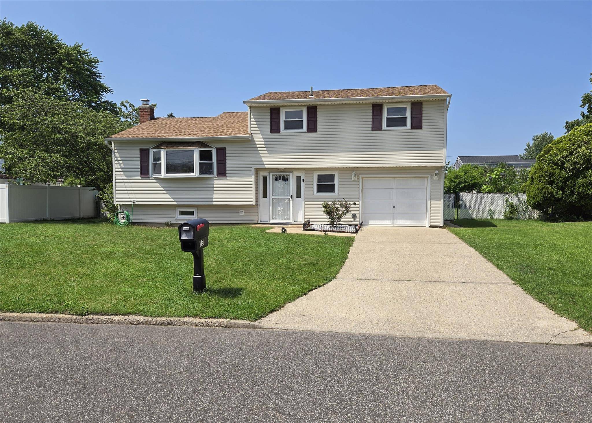 This well maintained Split level home features 4 bedrooms and 1.