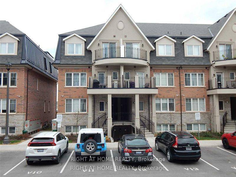 Discover the epitome of modern living in this stunningly upgraded stacked townhome, perfect for families working from home or those seeking an easy commute via QEW.
