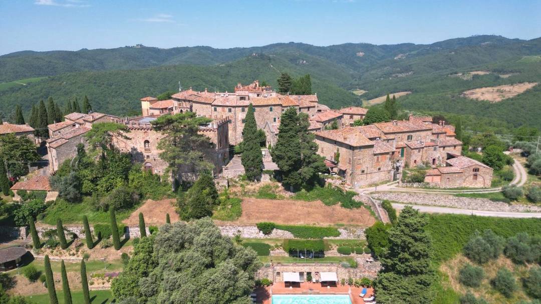 Exclusive Neo-Gothic castle in Montebenichi, in the Chianti region, featuring a swimming pool, self-contained apartments and panoramic views of the Tuscan hills.