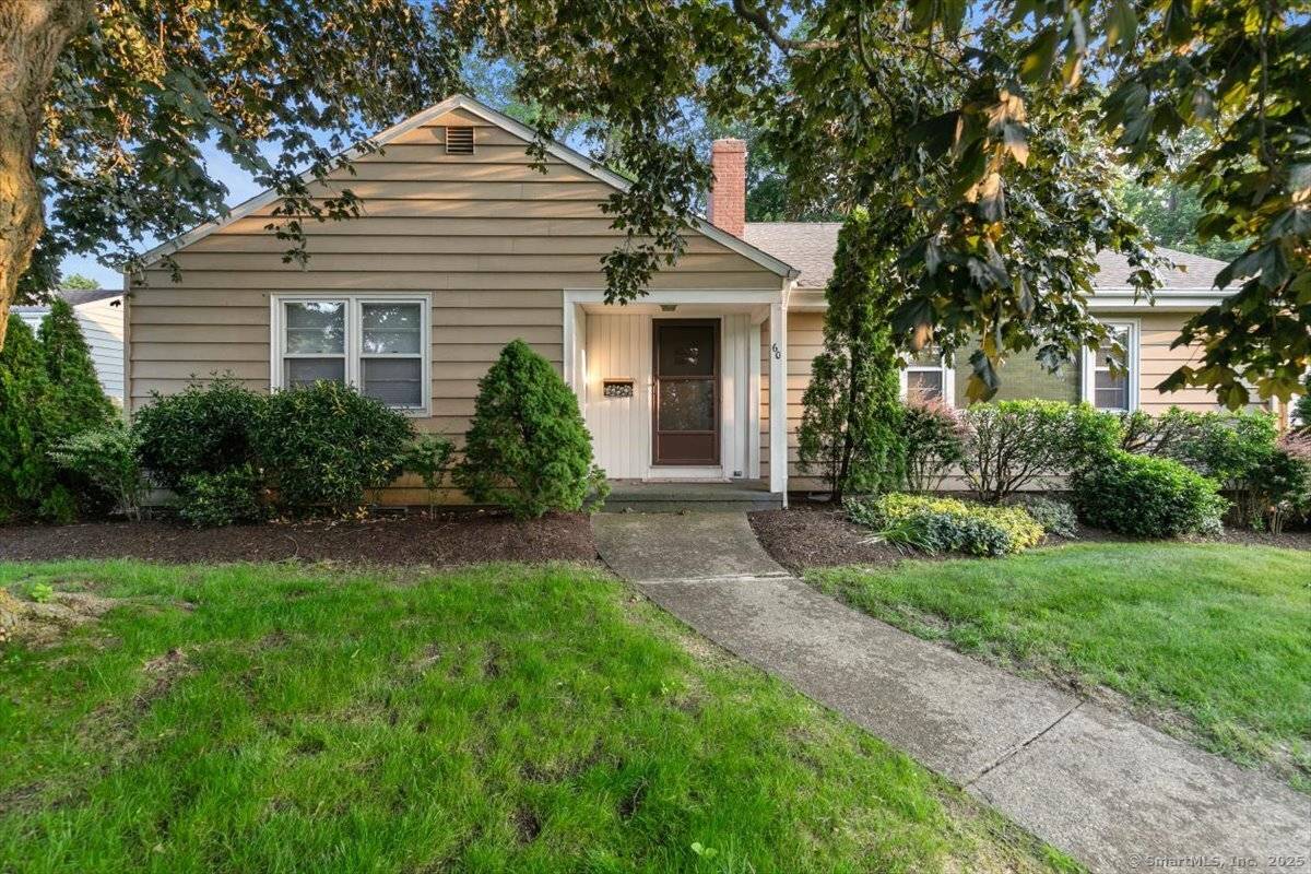 Welcome to 60 Ranch Road a bright coastal retreat with room to grow.