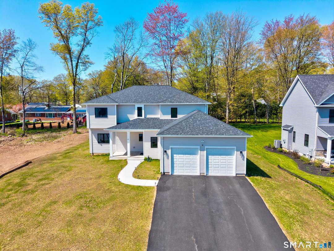 Welcome to 67 Luca Ln, an exceptional 2025 built luxury Colonial offering 3, 554 sq ft of refined living, situated on a quiet cul de sac in one of Wethersfield's ...