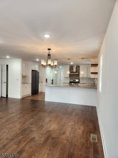 Welcome home to this beautiful new construction in East Orange.