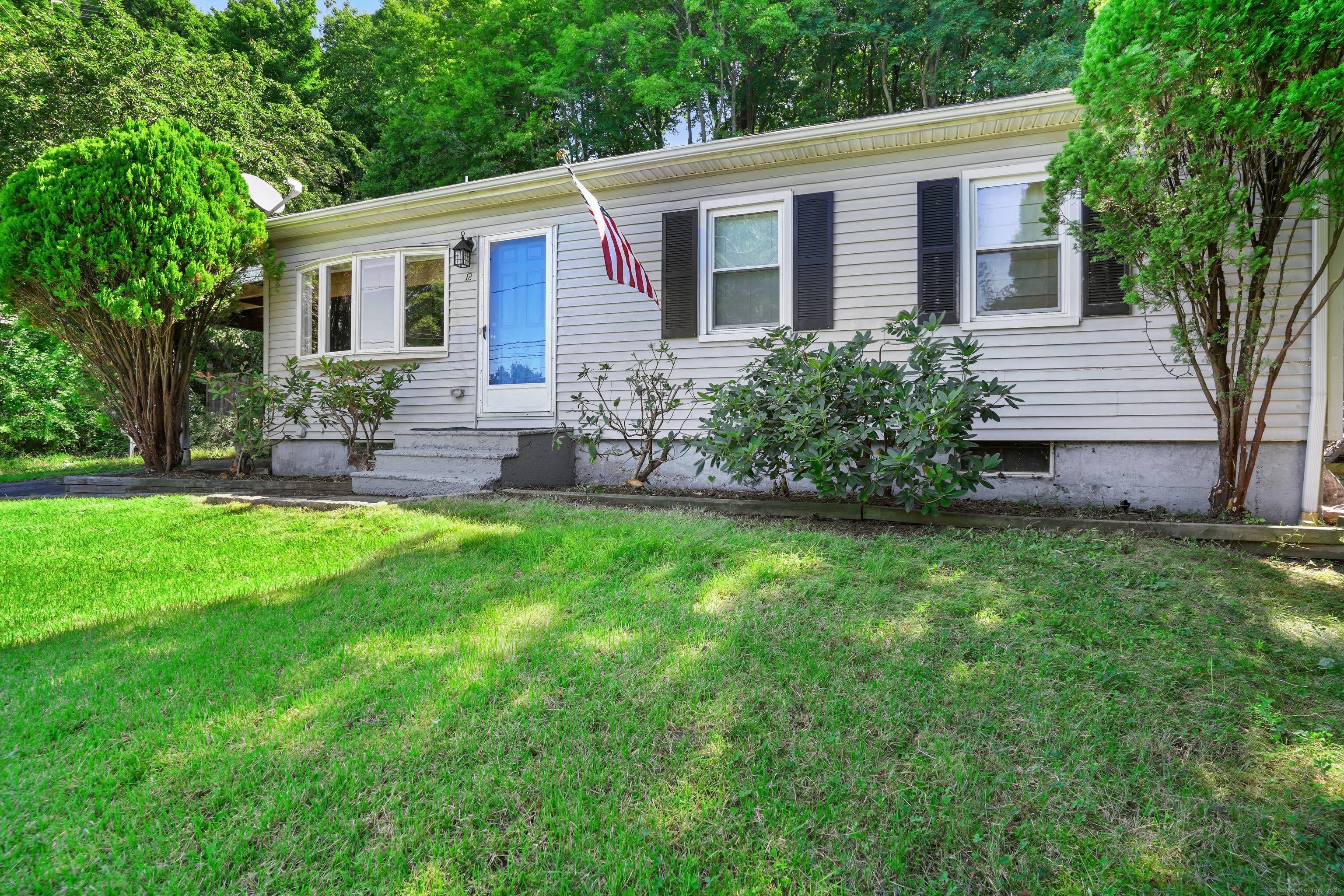 Embrace the warmth of this inviting 3 bedroom, 2 full bathroom home, crafted for cozy, comfortable living with desirable hardwood floors flowing through most of the main level and wall ...