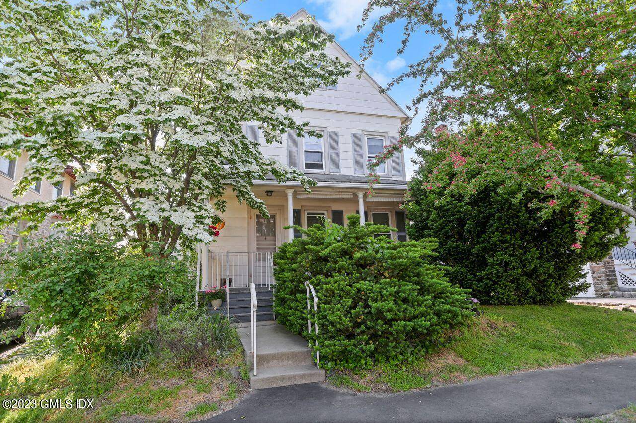 On a quiet tree lined street located in the heart of Greenwich, this home welcomes buyers wishing to have the convenience of all amenities at their doorstep.