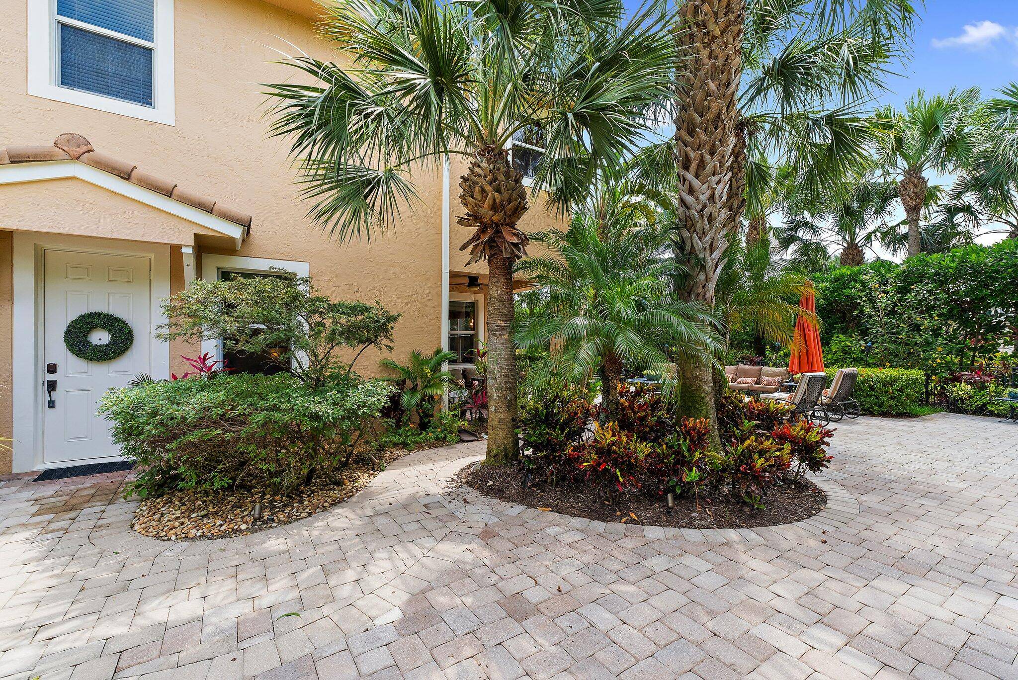 Nestled behind the gates of Paloma in Palm Beach Gardens, this 3 bedroom, 2.