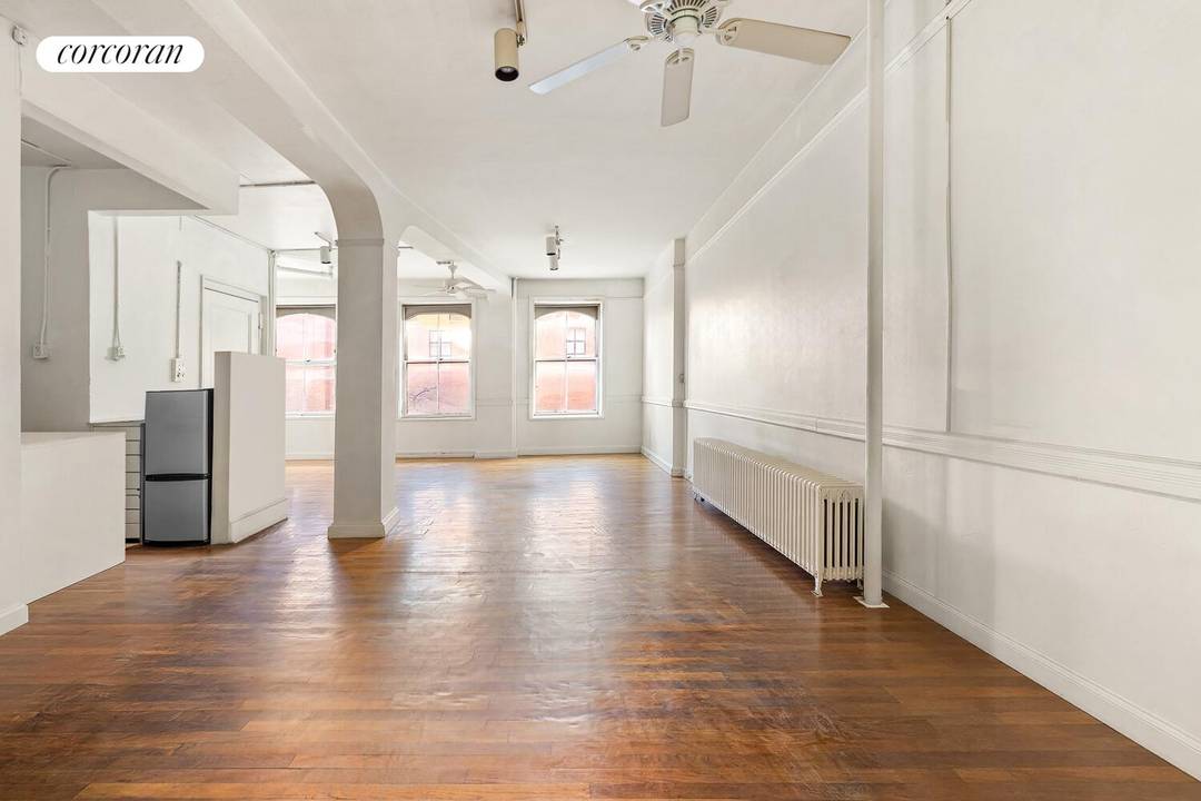 WEST VILLAGE GEM. From the moment you walk into this unique corner loft with 13 windows and 3 bright exposures, there's an almost indescribable feeling of WOW.