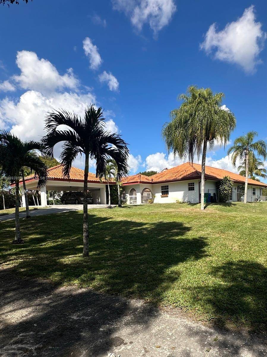 Custom home sitting comfortably on more than 2 acres.