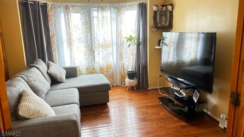 Beautifully maintained and thoughtfully updated two family home perfect for both homeowners and investors !