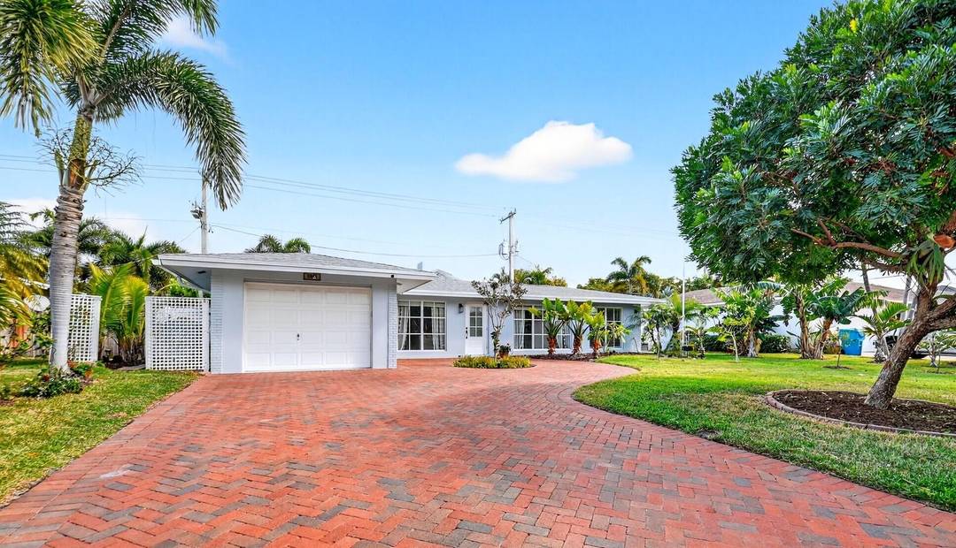 Discover this beautifully updated 3 bedroom, 2 bath pool home in the highly sought after Chapel Hill neighborhood of East Boynton Beach.