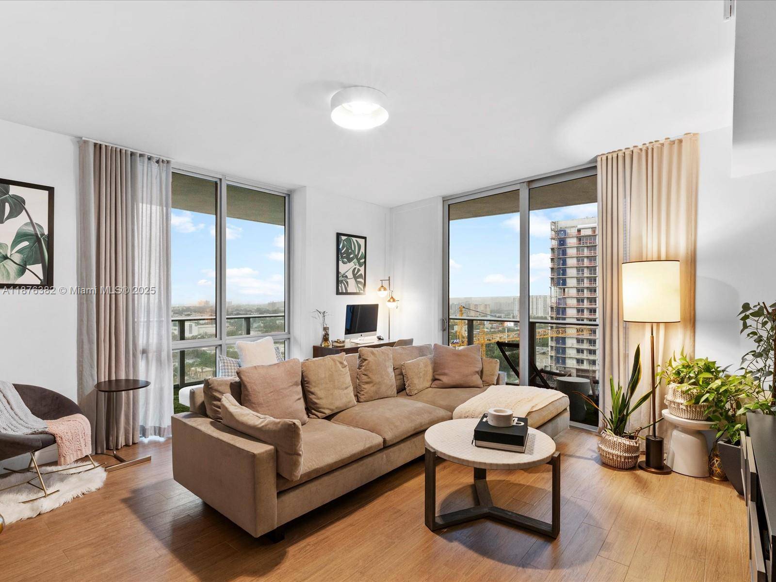 Spacious 2BR 2. 5BA corner unit at Brickell Ten with modern European kitchen featuring Bosch appliances, quartz counters, Italian cabinetry and baths.