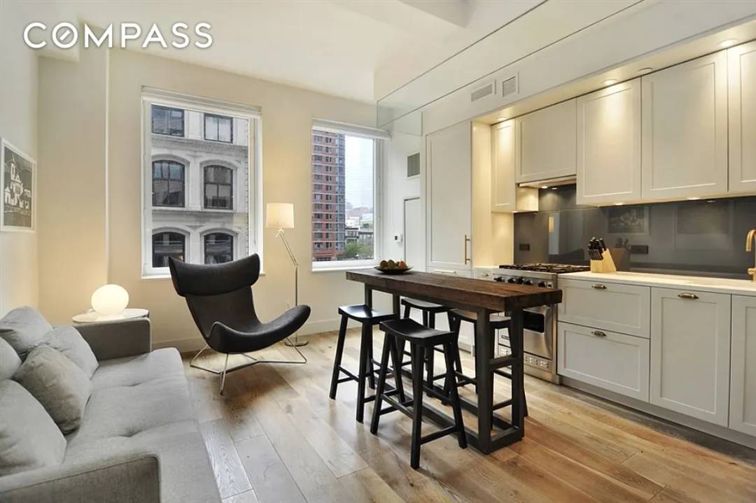 Welcome to your new modern perch in the heart of Tribeca at 93 Worth Street, Unit 405.