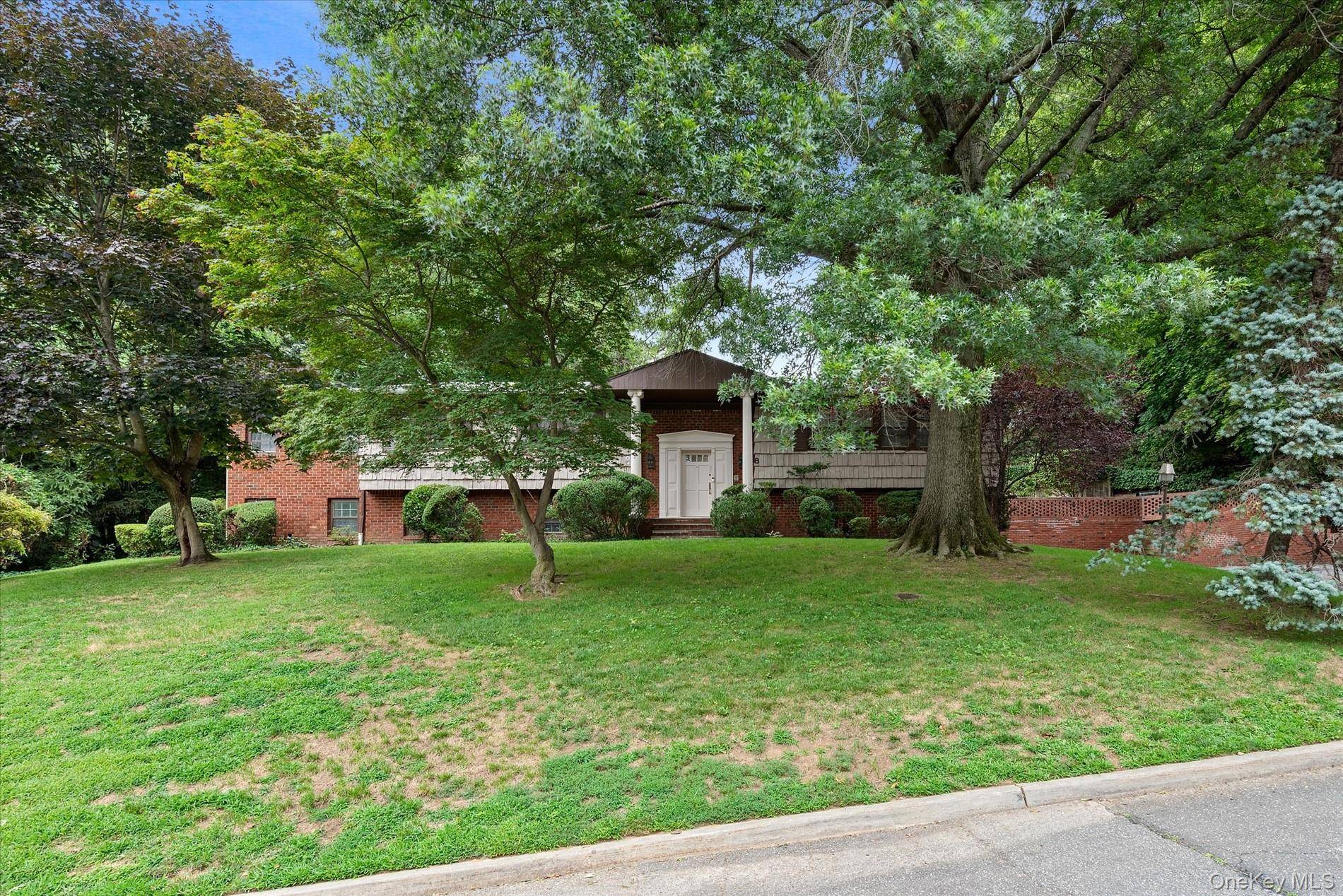 Spacious Hi Ranch in Prestigious Village of Great Neck Estates.