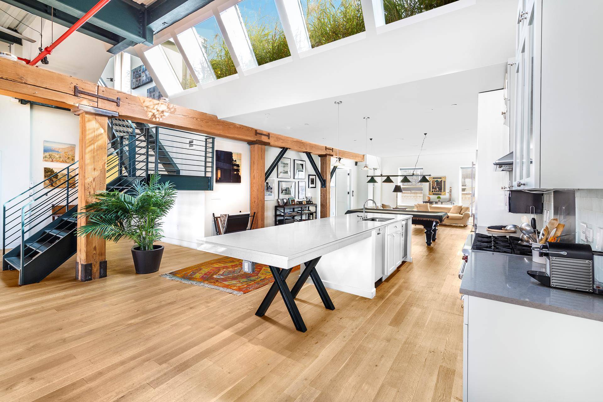 First time on the market Trophy Penthouse with direct Hudson river views and a large landscaped magical 1100 square foot garden in recently converted Spice Warehouse condominium.