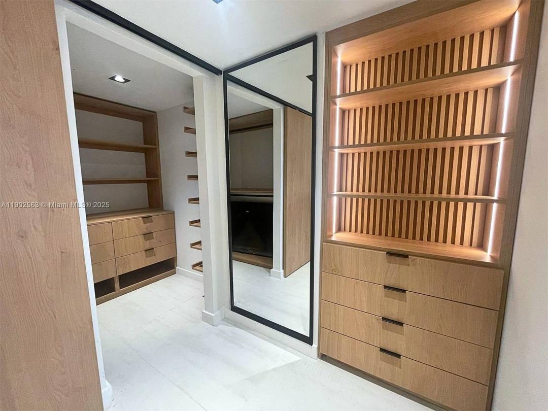 Newly remodeled 2 bed 2 bath residence in Sunny Isles Beach featuring elegant wood finishes, light filled living areas and a refined open, split bedroom layout.