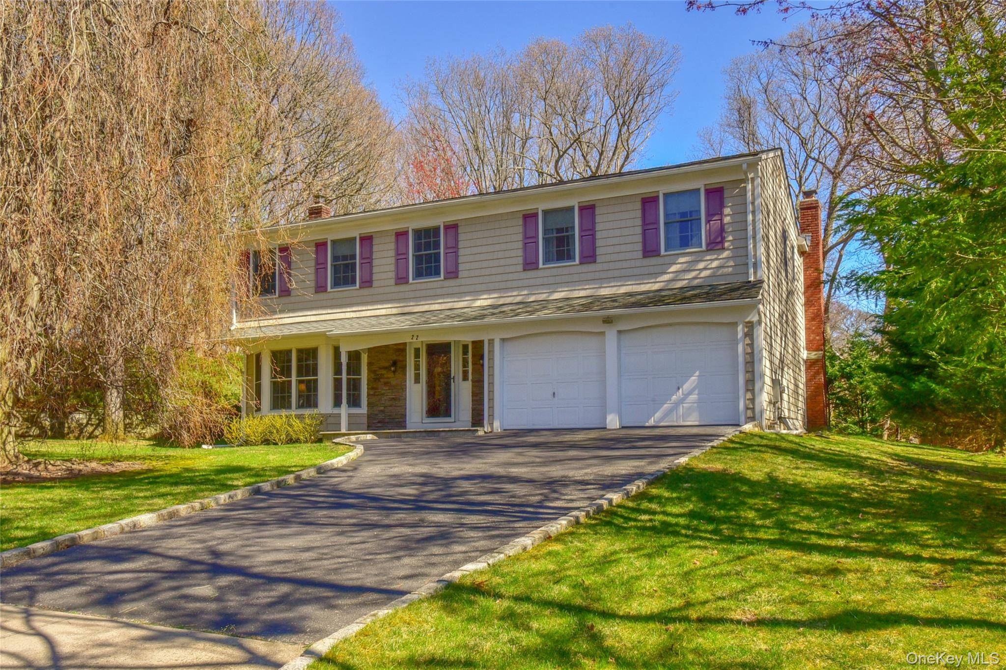 Impeccably maintained and truly move in ready, this stunning home is situated on a peaceful cul de sac, offering just shy of an acre of private, serene property.