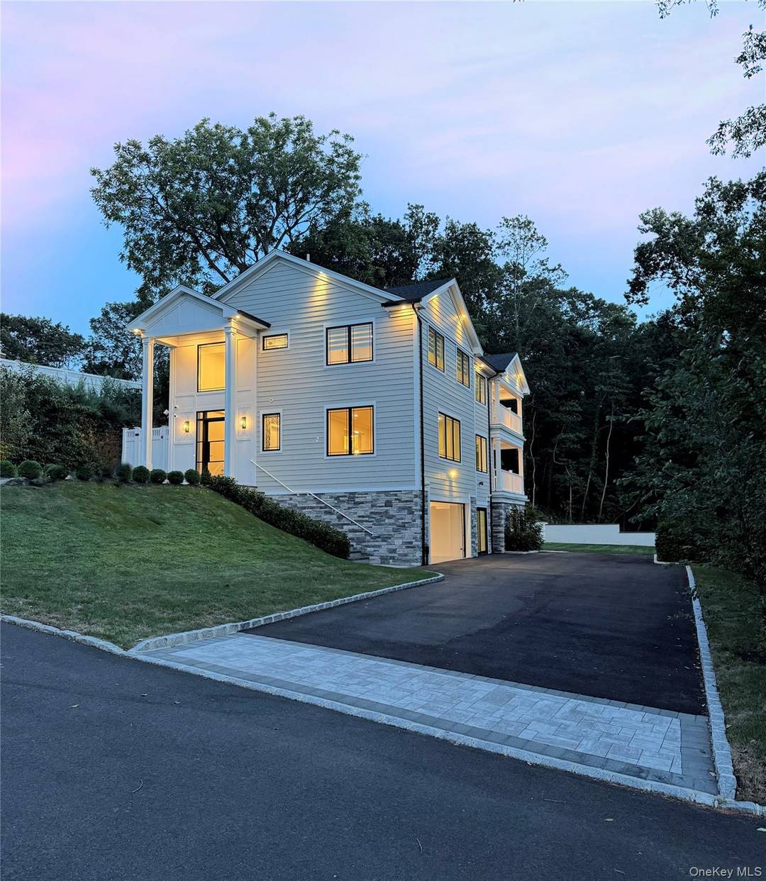 Exceptional new construction colonial nestled in the prestigious hamlet of Woodbury, NY.