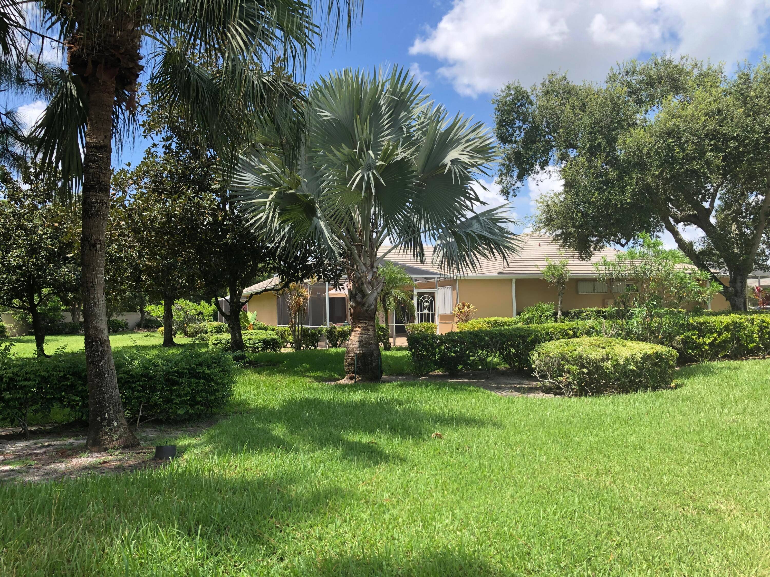 A WELL MAINTAINED VILLA IN THE 55 SUN TERRACE NEIGHBORHOOD OF THE LAKES AT ST LUCIE WEST COMMUNITY.