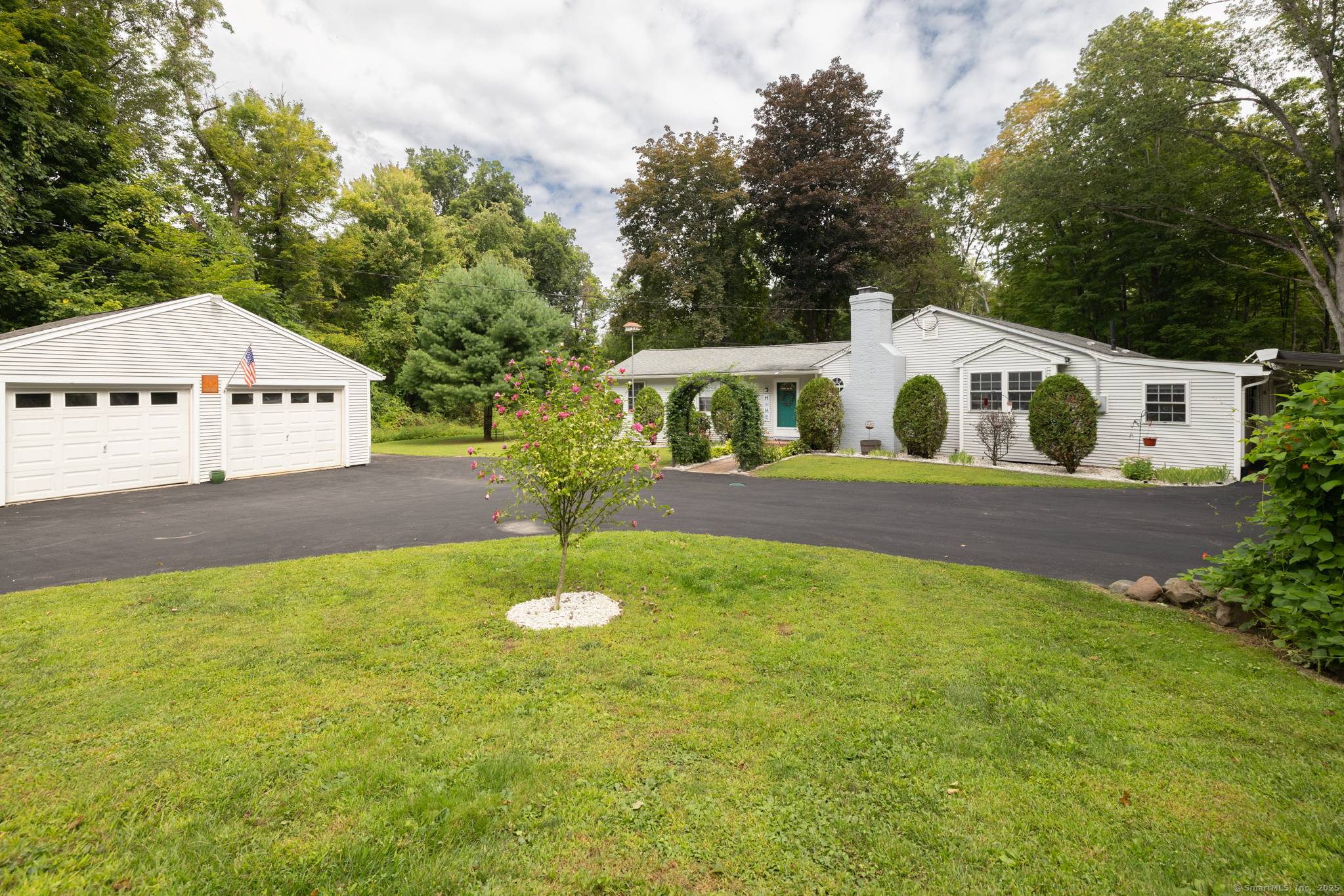 Discover this beautifully updated ranch style home ideally situated on over an acre of level, private land, backing onto a tranquil nature preserve in the heart of Woodbury.