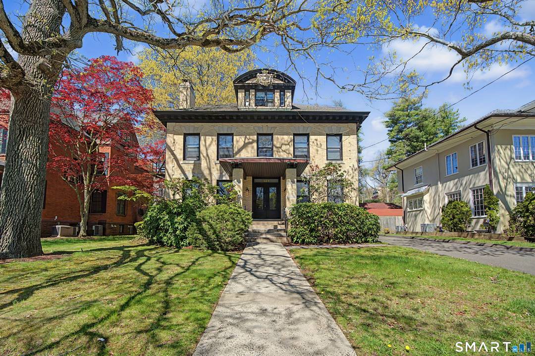 Stately and prominent 4, 379 sq ft brick building in the heart of East Rock on Whitney Ave.