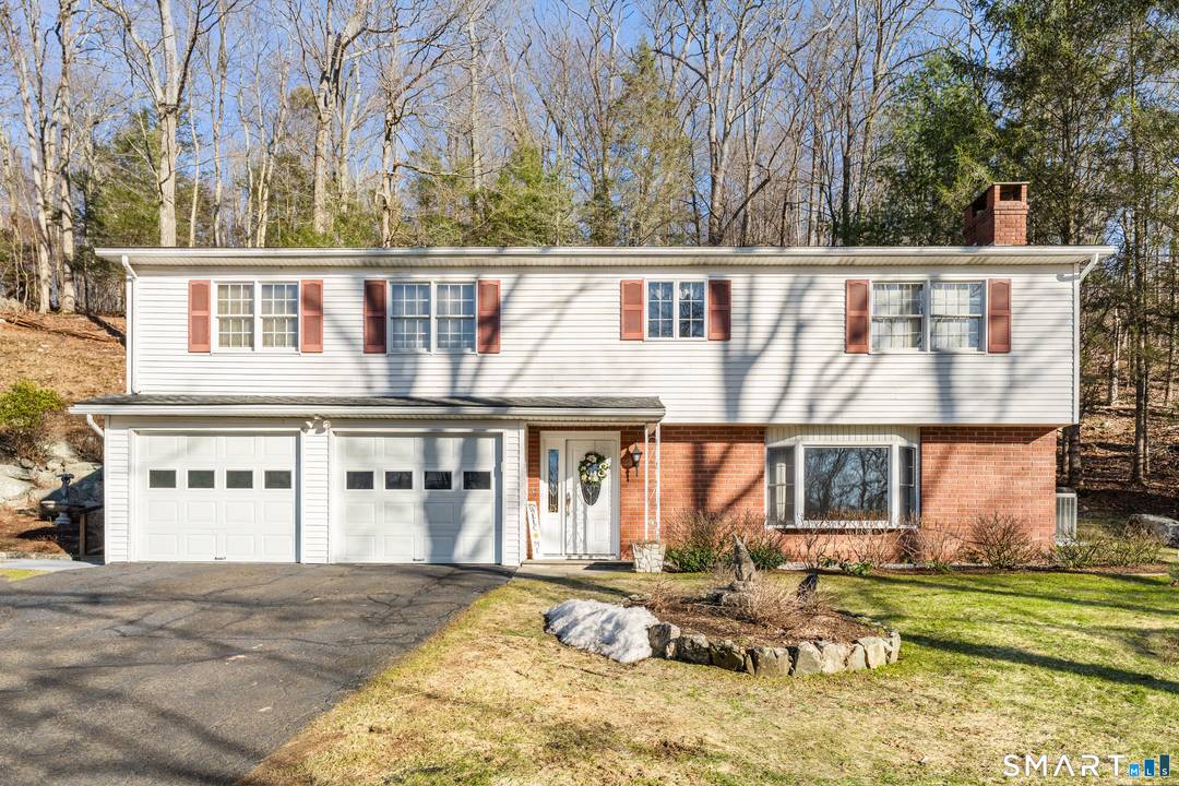 Excellent opportunity to own this three bedroom, three full bath residence with separate in law apartment.