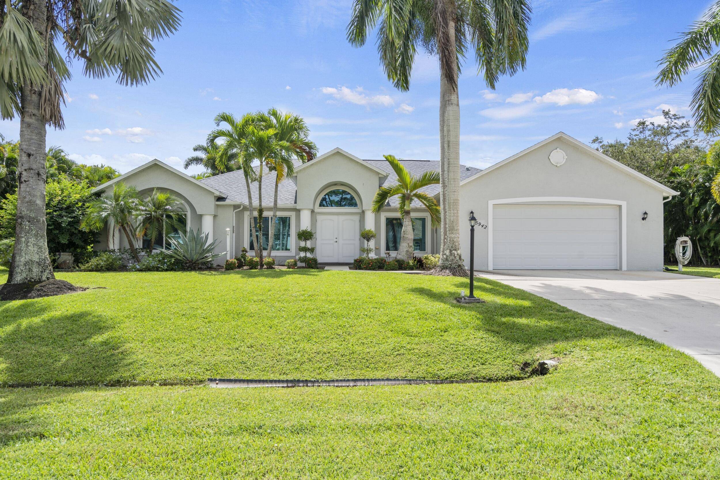 Picturesque pool home on an 1 2 Acre lot with Great Curb Appeal plush landscaping in the desirable Torino neighborhood !